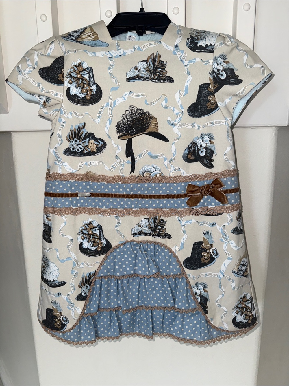 Girls Beige & Blue Vintage Hat Print Dress with Polka Dot Ruffle